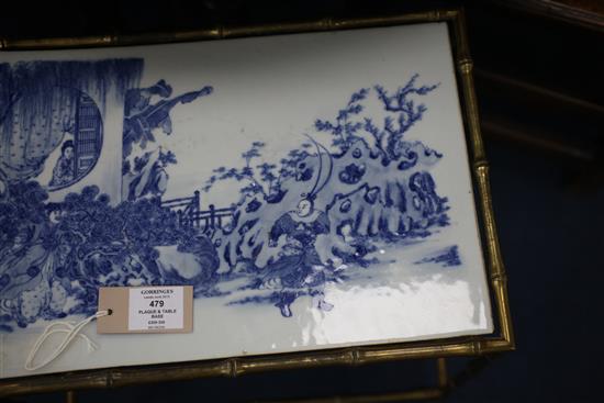 A Chinese blue and white tile or plaque, late 19th century,